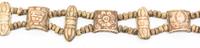A String of Tibetan Carved Bone Beads Length 20 inches.