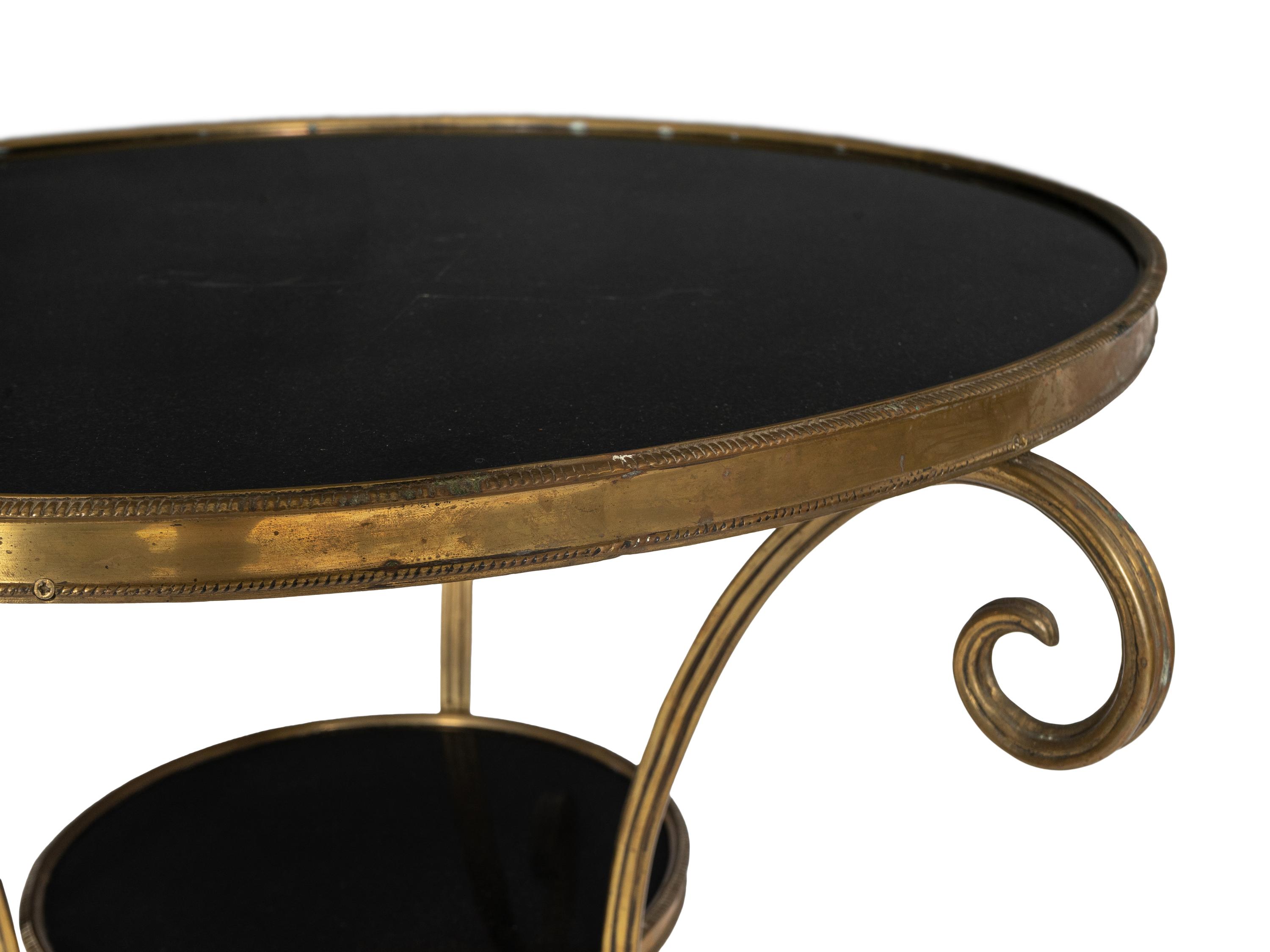 A French Empire Style Gilt Bronze and Black Granite Gueridon Table
