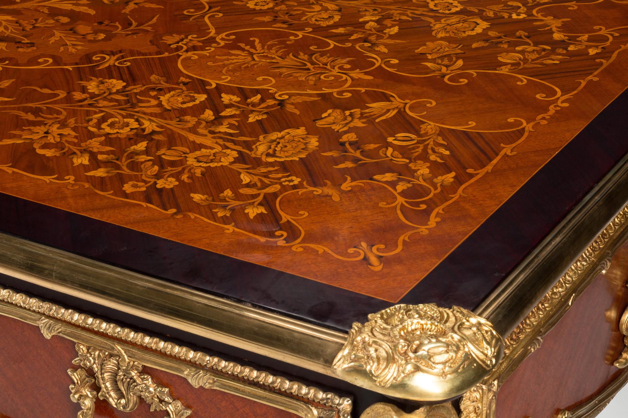 A Louis XV Style Gilt Bronze Mounted Marquetry Bureau Plat