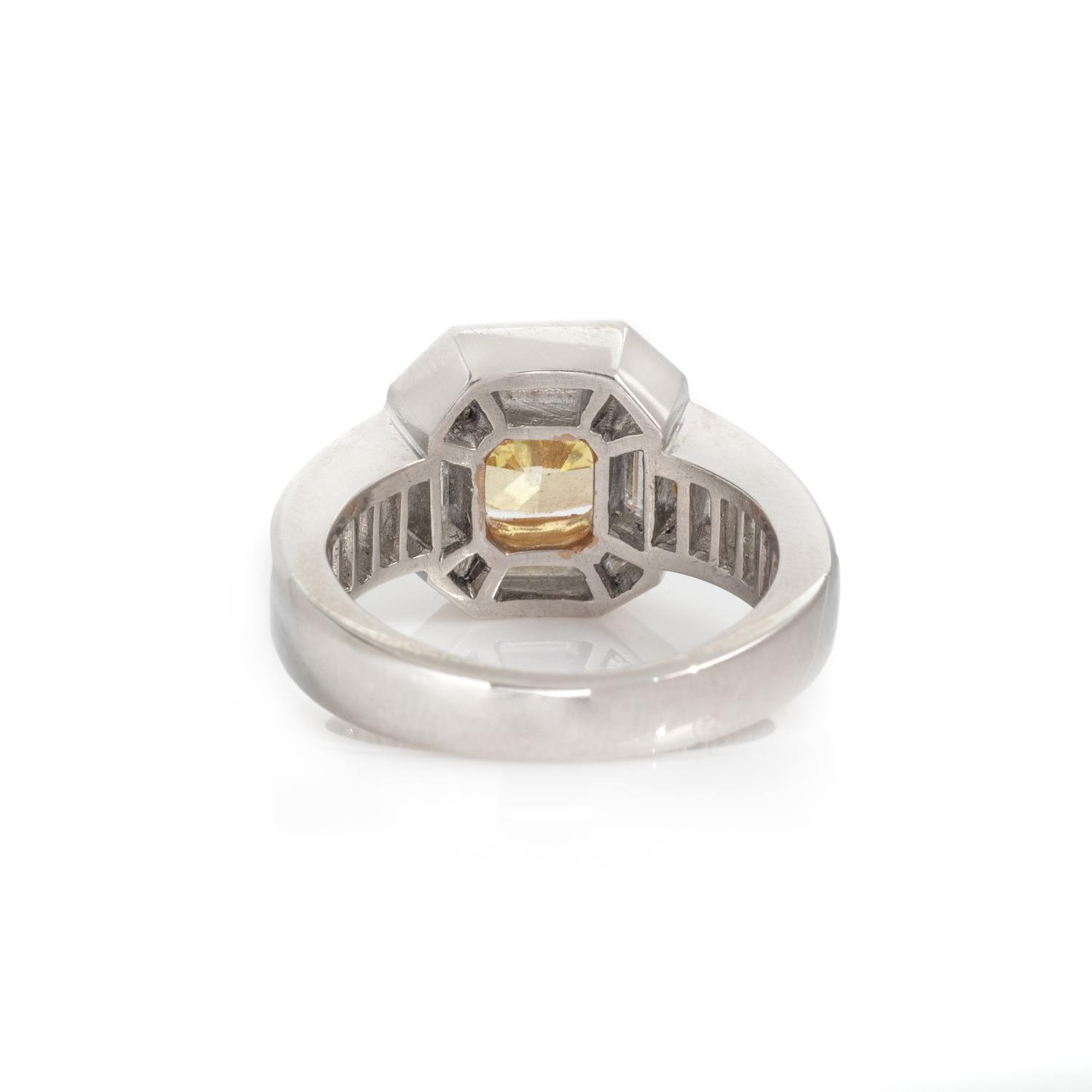 FANCY INTENSE YELLOW DIAMOND AND DIAMOND RING
