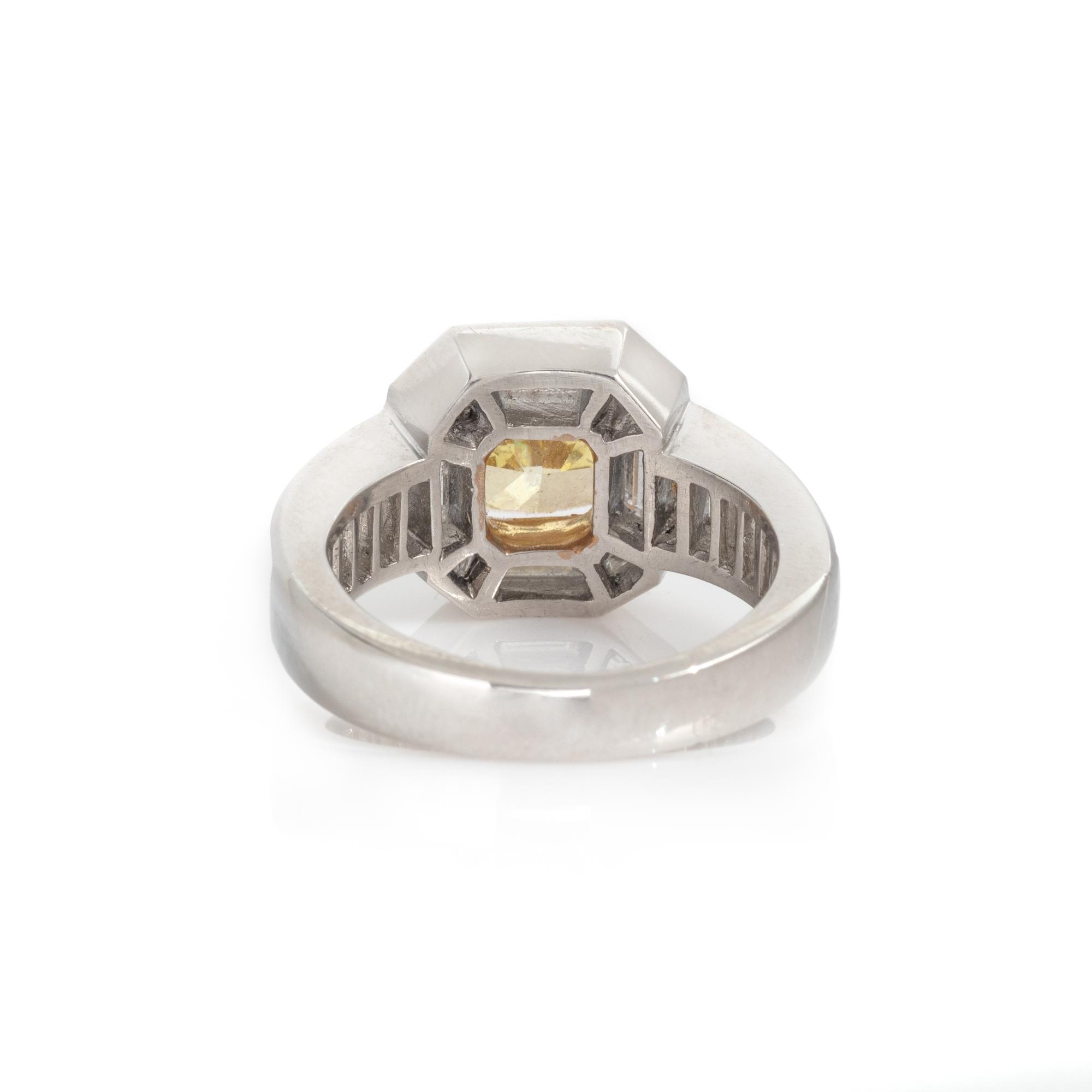 FANCY INTENSE YELLOW DIAMOND AND DIAMOND RING