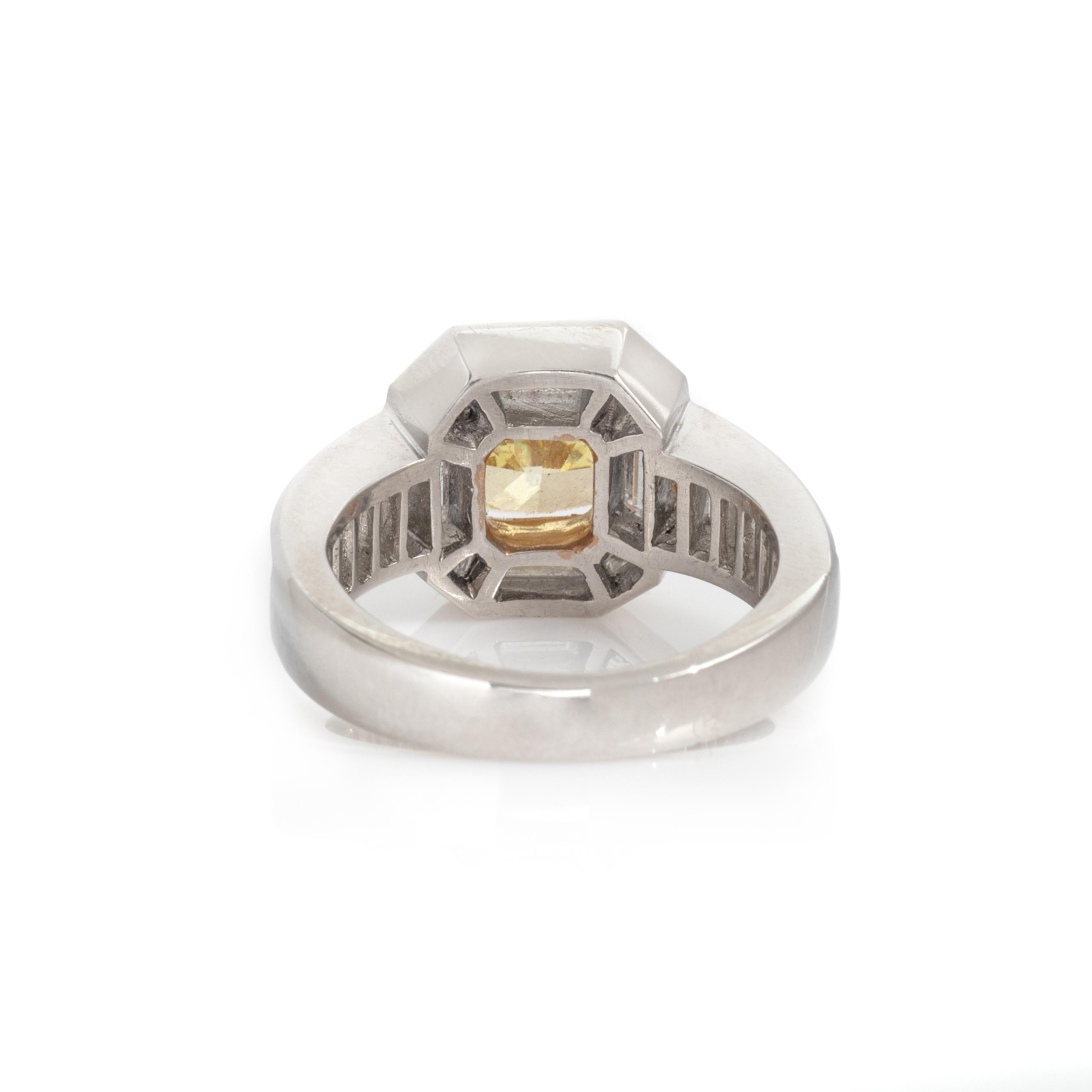 FANCY INTENSE YELLOW DIAMOND AND DIAMOND RING