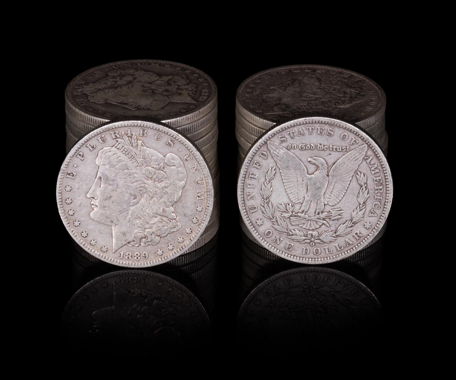 A Group of Twenty-Nine United States 1889-O Morgan Silver Dollar Coins