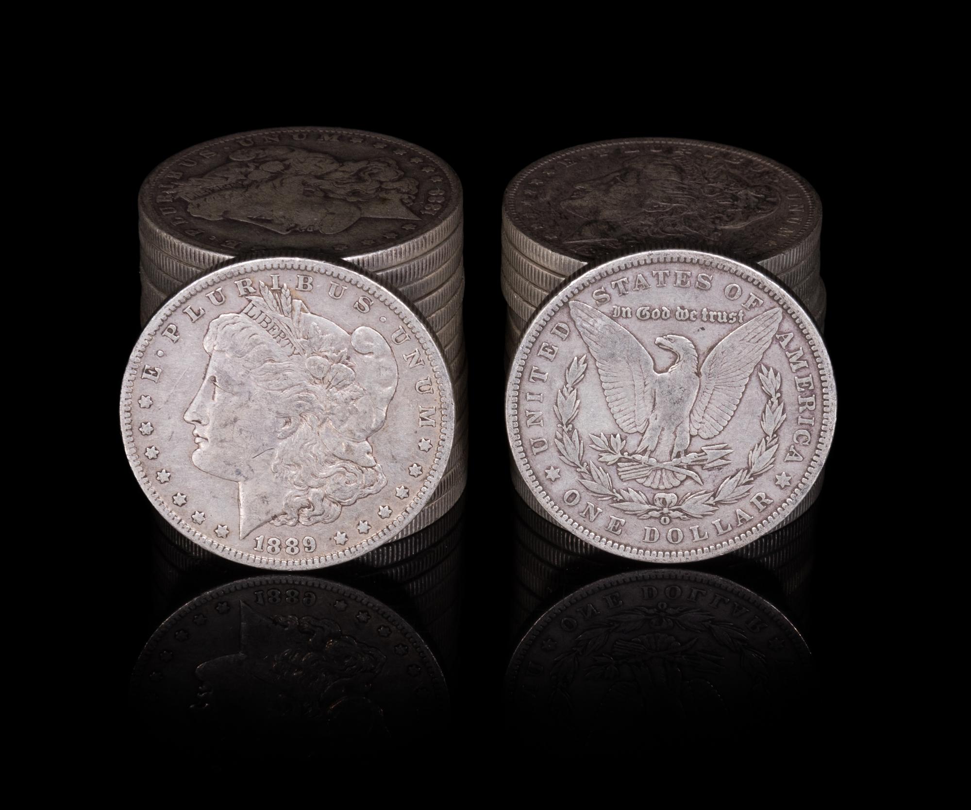 A Group of Twenty-Nine United States 1889-O Morgan Silver Dollar Coins