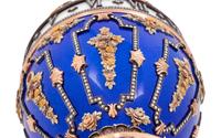 A Gold, Enamel and Diamond Inset Egg-Form Annular Clock