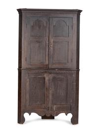 A Federal Grain Painted Cherrywood Corner Cupboard