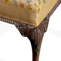 A George III Style Carved Mahogany Stool with Needlepoint Upholstery