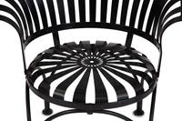 A Spring Steel Garden Table and Eight Chairs by Francois Carre
