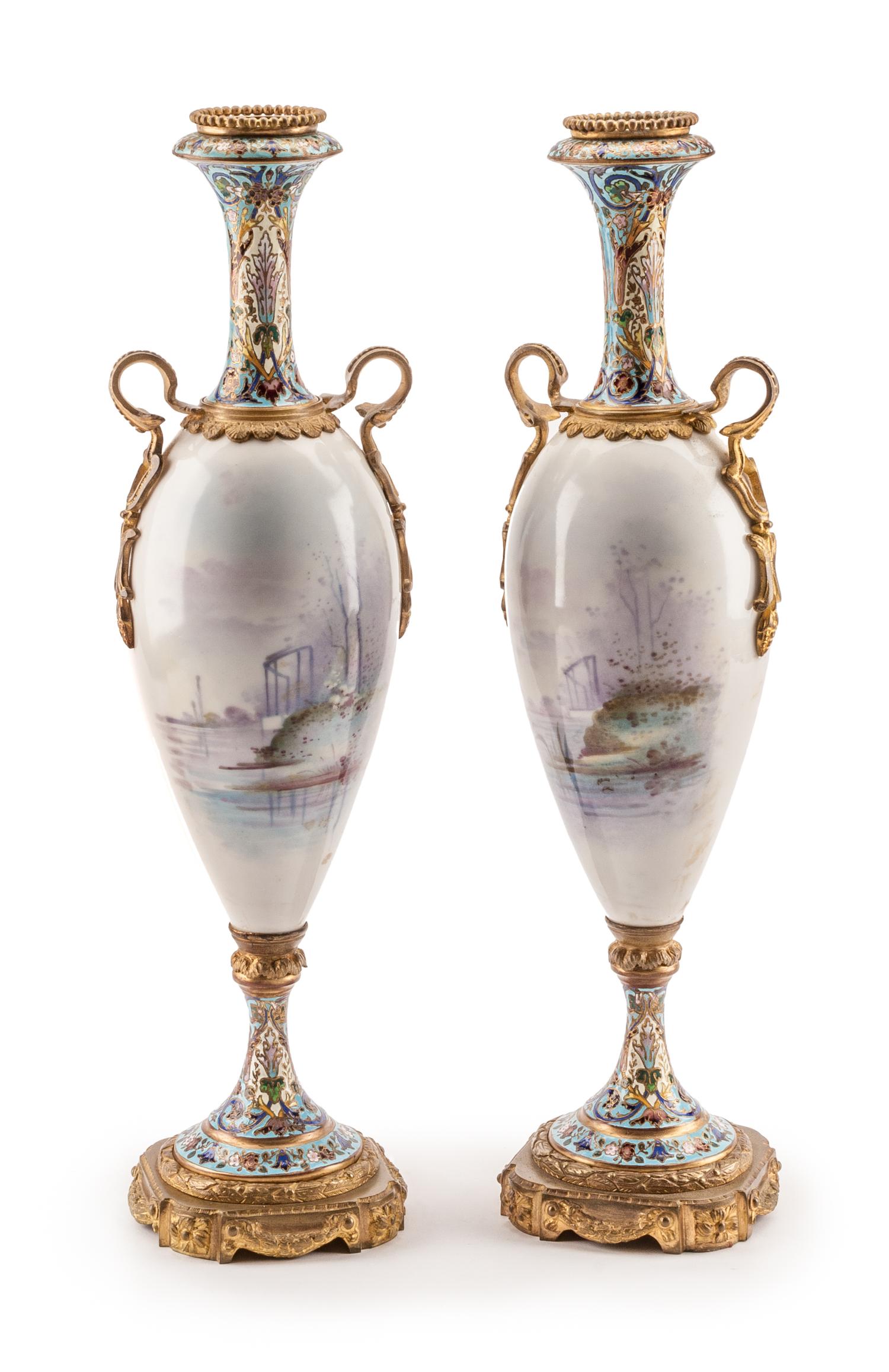 A Pair of French Porcelain and Champleve Urns Height 19 1/2 inches. — 19TH CENTURY