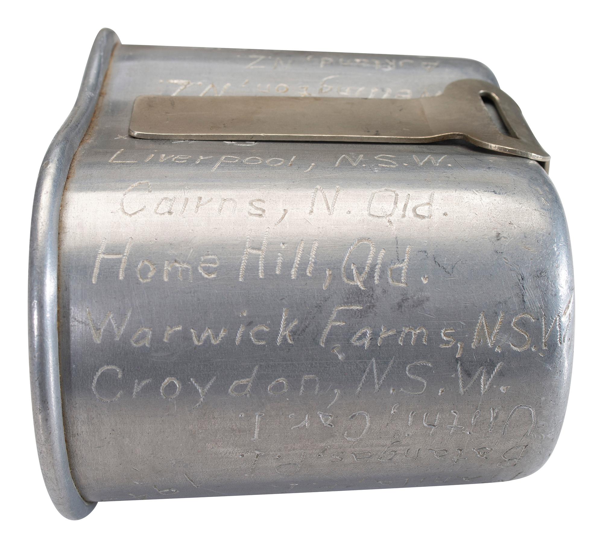 [MILITARIA]. World War II and Korean War-era canteens, canteen covers, and mess kits.