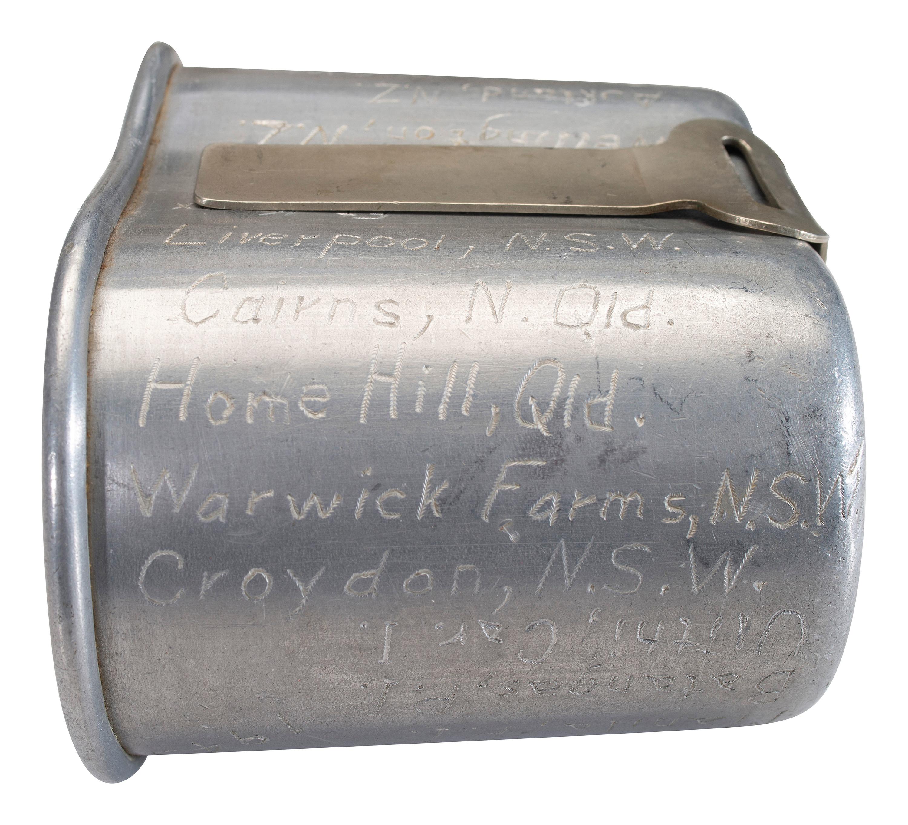 [MILITARIA]. World War II and Korean War-era canteens, canteen covers, and mess kits.