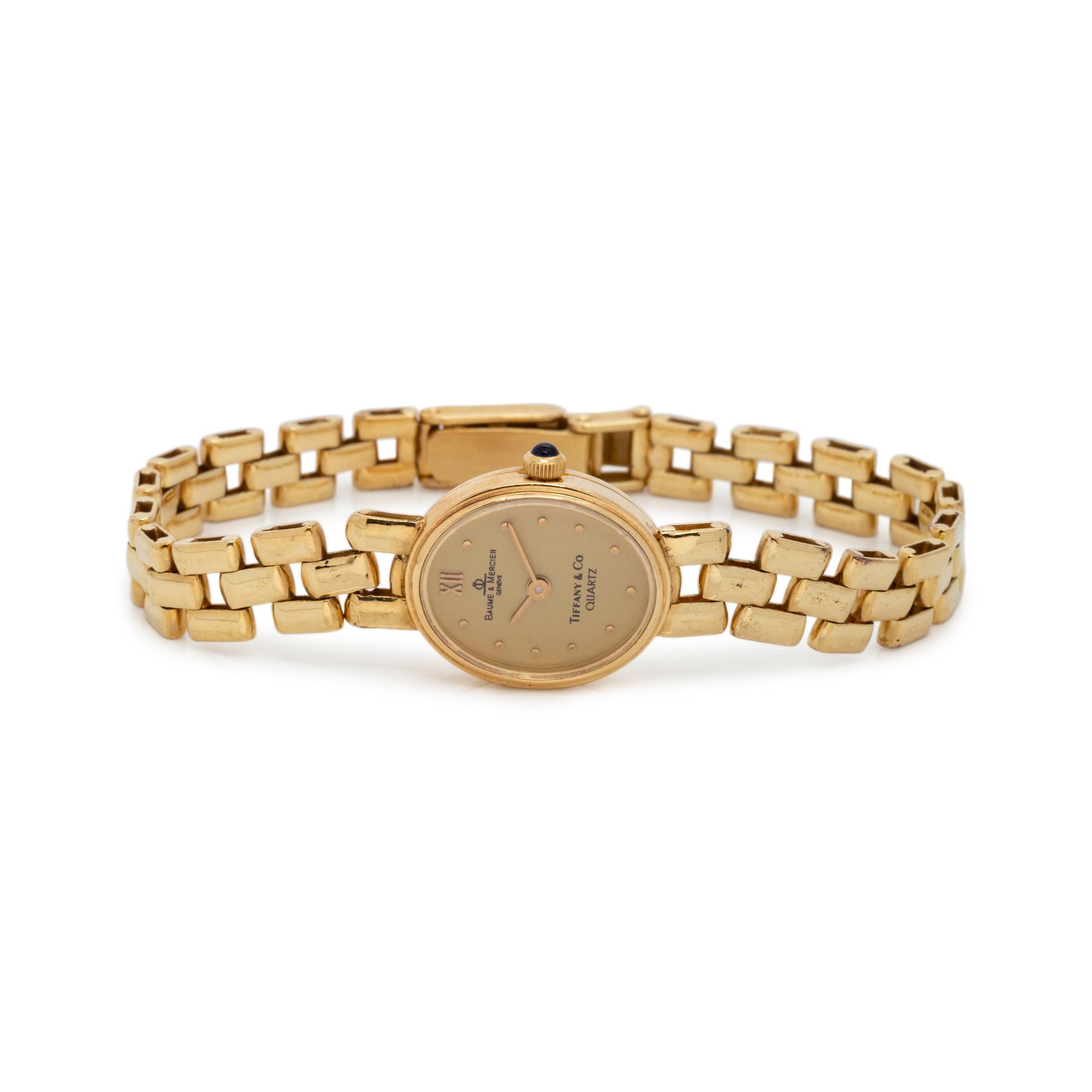 TIFFANY & CO., BAUME & MERCIER, 14K YELLOW GOLD WRISTWATCH