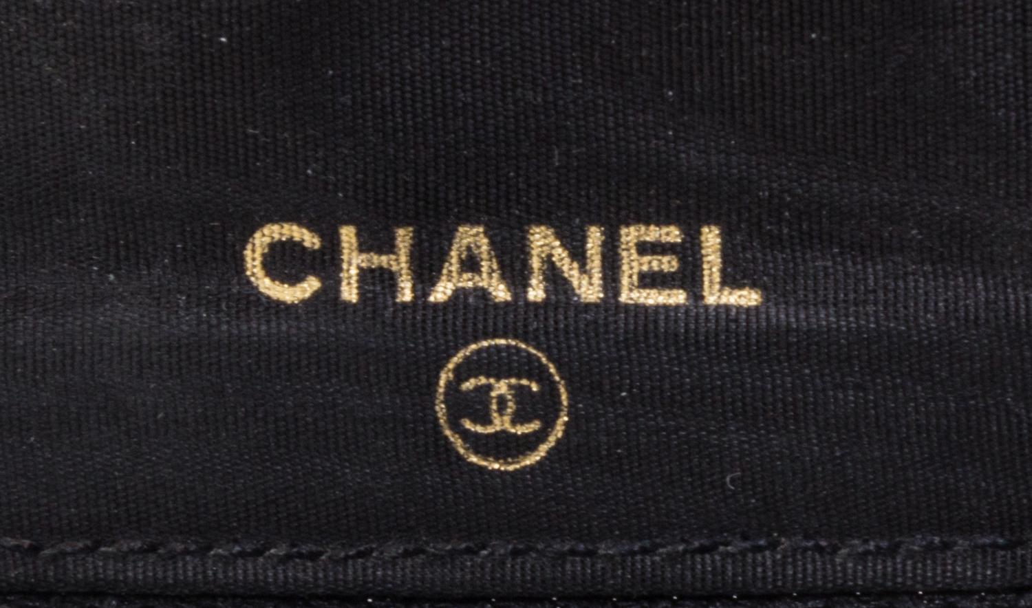 A Chanel Black Caviar Leather Coin Purse, 4.5" x 3.5" x 5".