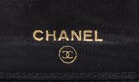A Chanel Black Caviar Leather Coin Purse, 4.5" x 3.5" x 5".