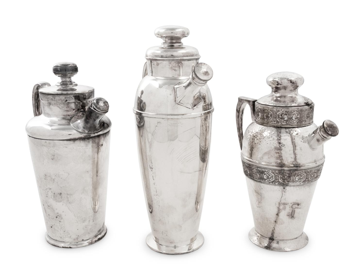 A Group of Three Silver-Plate Cocktail Shakers