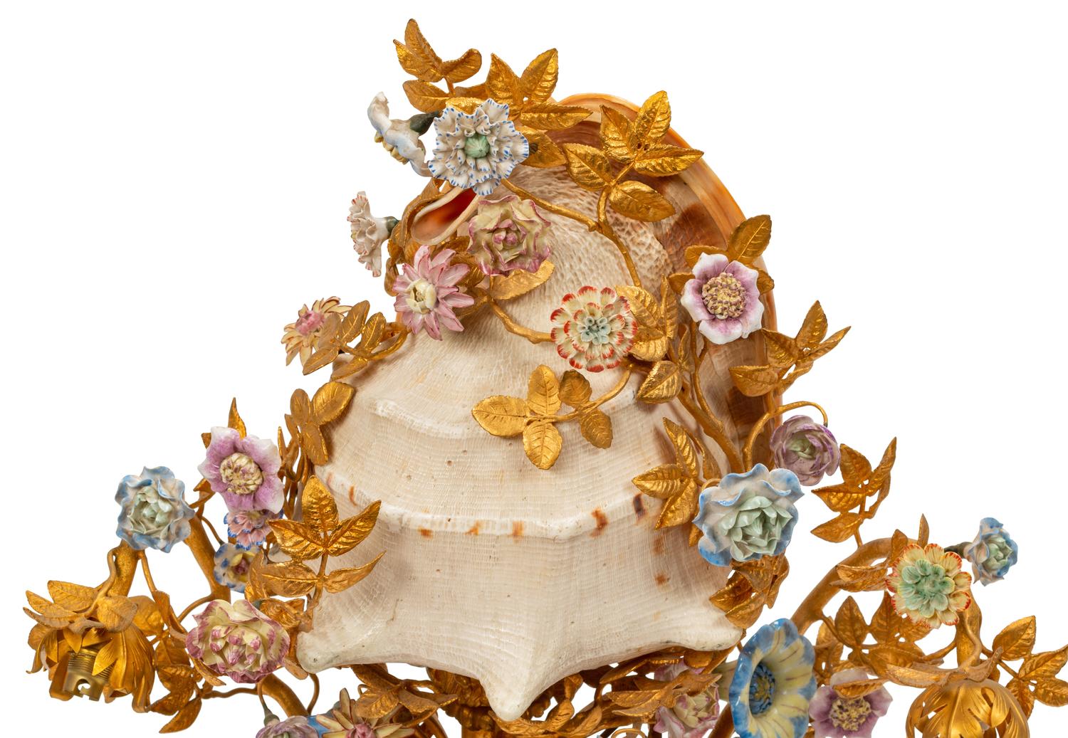 A Louis XV Style Gilt Bronze, Porcelain and Seashell Mounted Sea Motif Lamp