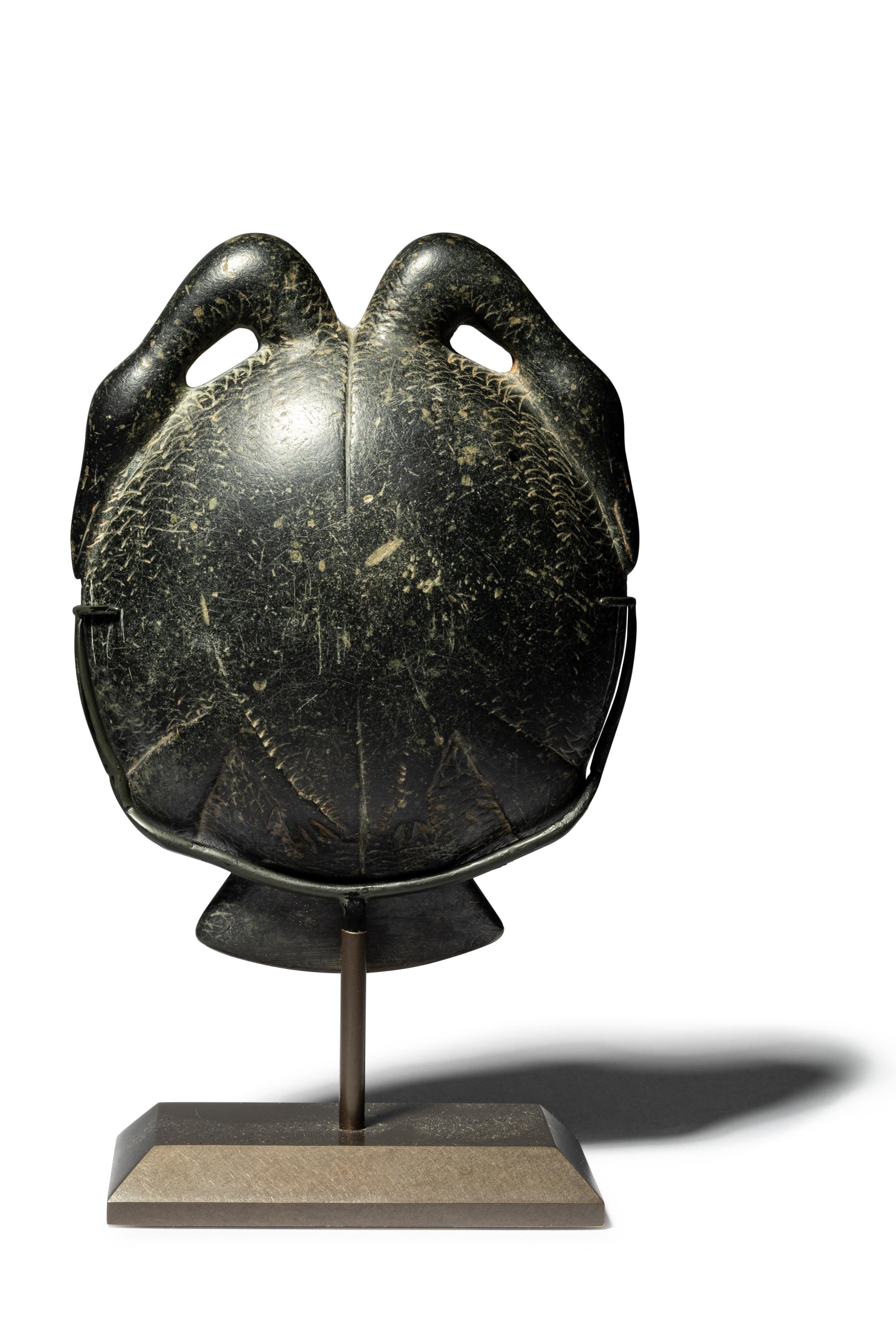 An Egyptian Stone Bowl or Palette in the Shape of a Double Duck