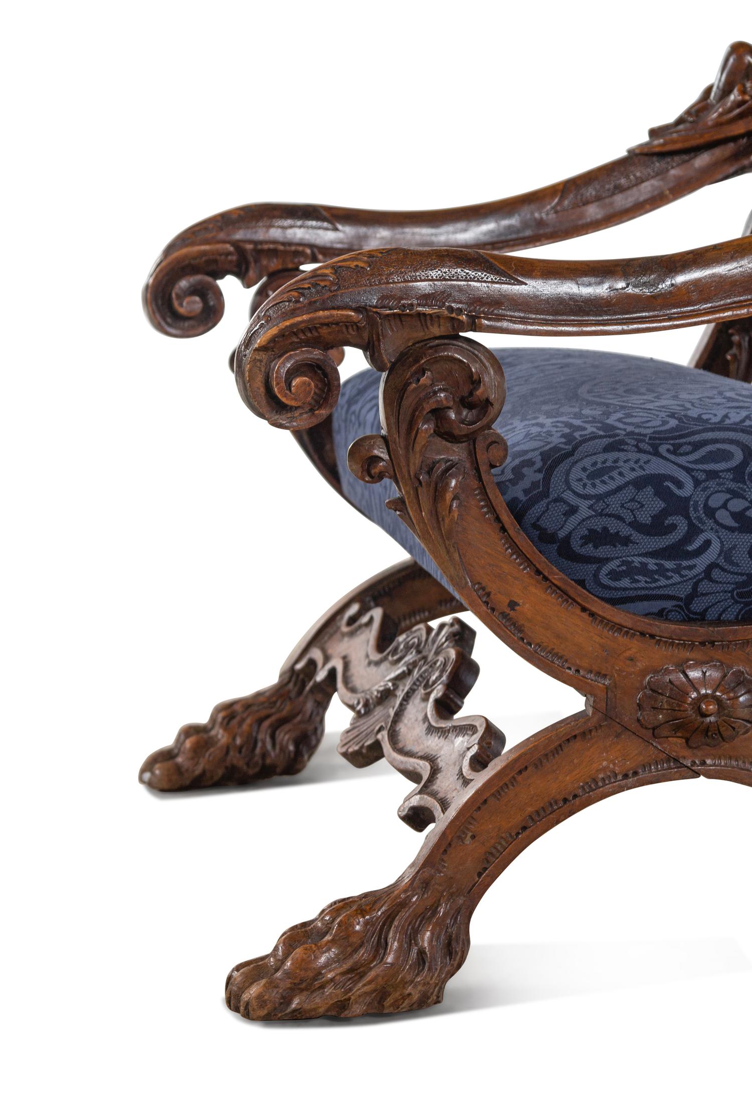 A Pair of Italian Renaissance Style Carved Walnut Armchairs