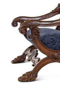 A Pair of Italian Renaissance Style Carved Walnut Armchairs