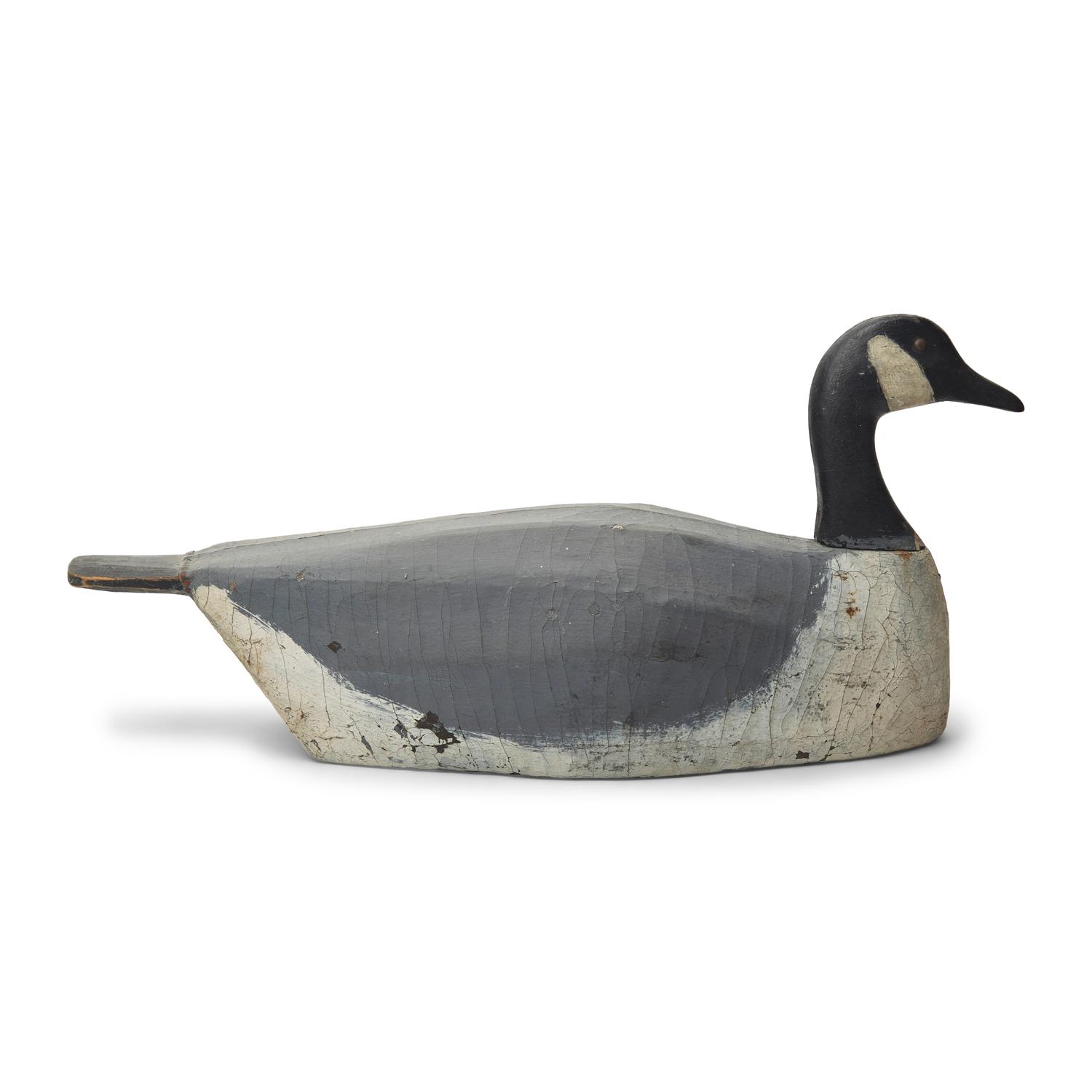 A Carved and Painted Wood and Canvas Canada Slat Goose Decoy