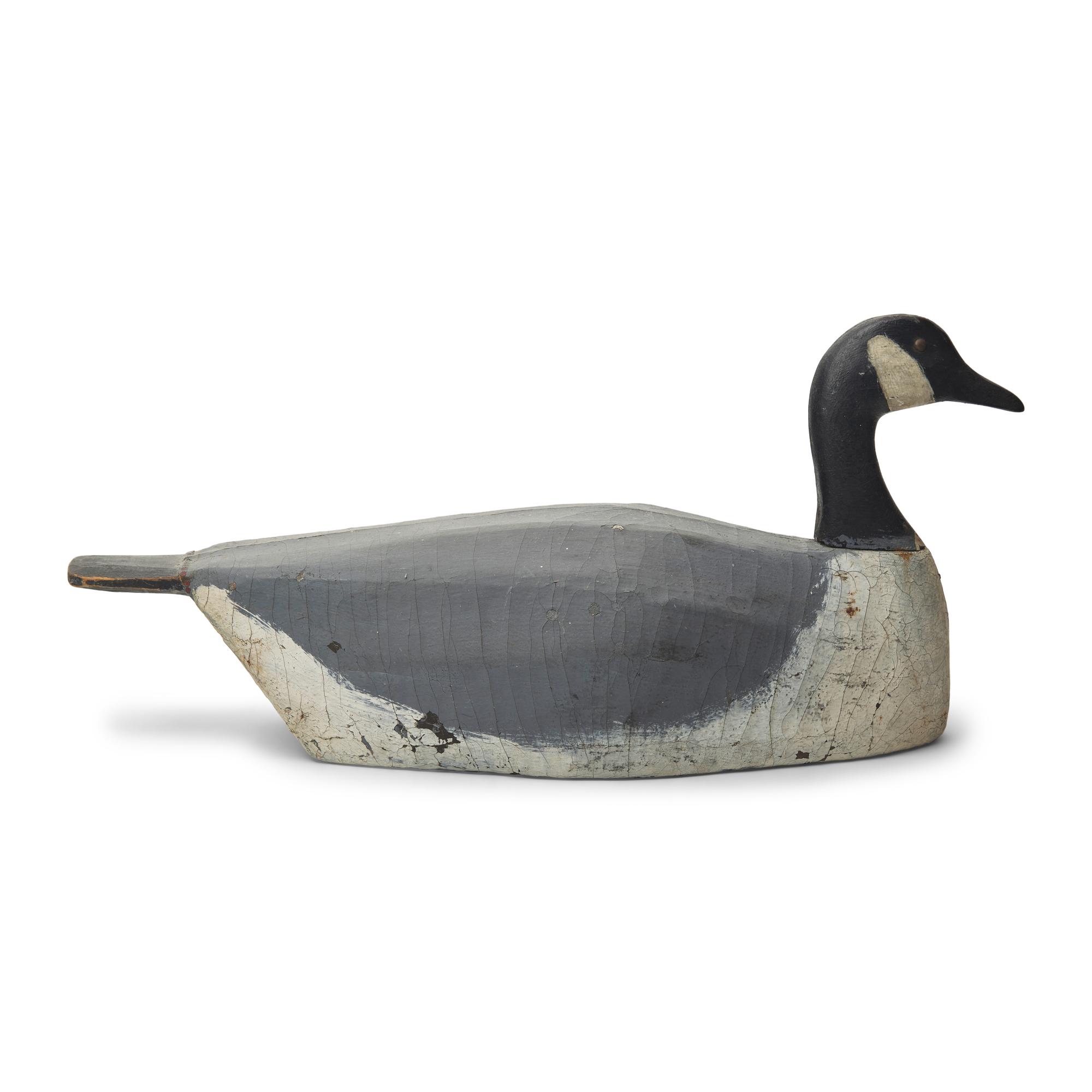 A Carved and Painted Wood and Canvas Canada Slat Goose Decoy