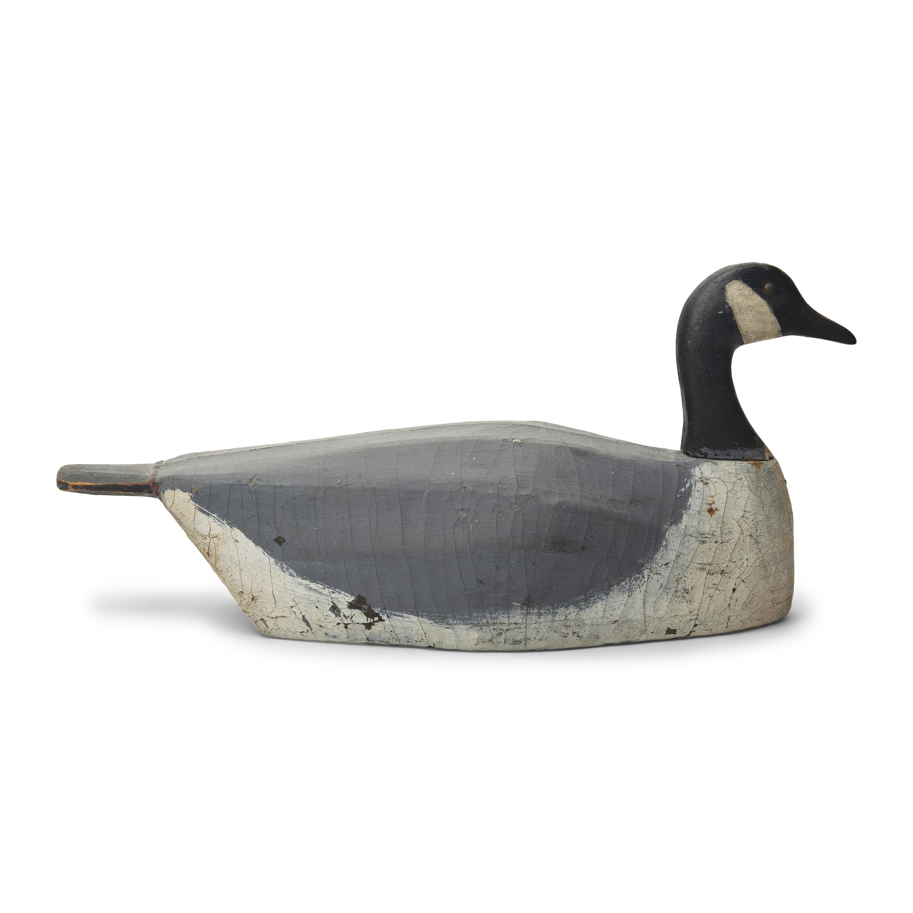 A Carved and Painted Wood and Canvas Canada Slat Goose Decoy