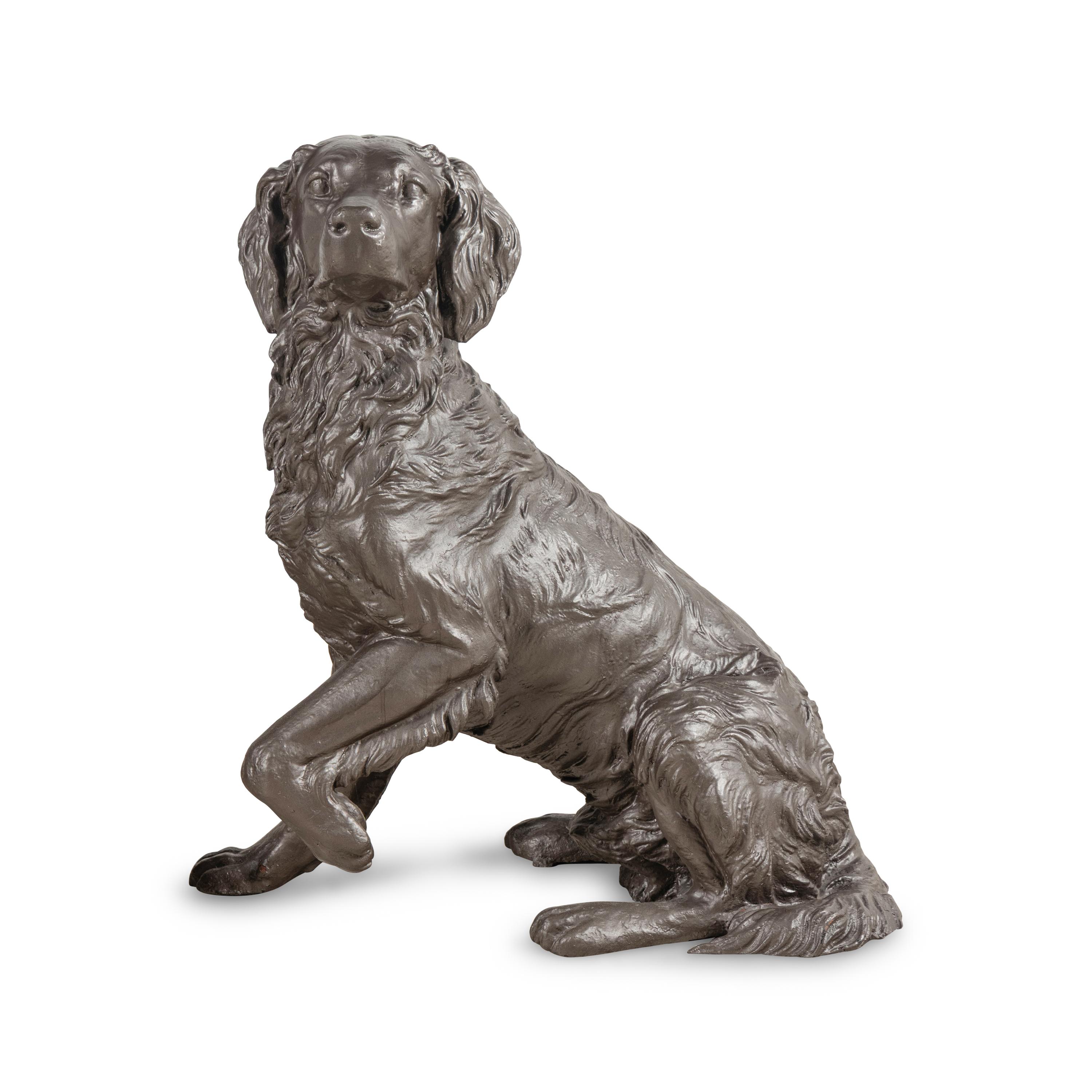 A Cast Iron Sculpture of a Dog
