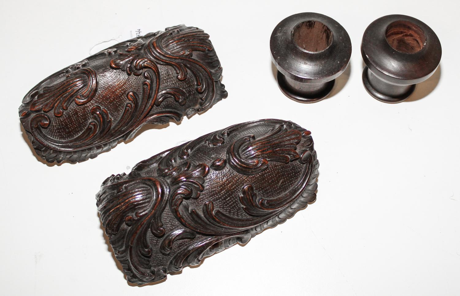 A Set of Four Wood Decorative Articles Length of longest 7 3/4 inches.