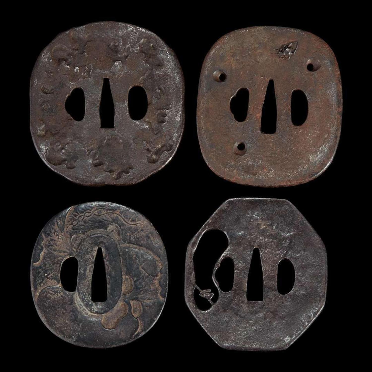 Group of twelve assorted Japanese iron tsuba