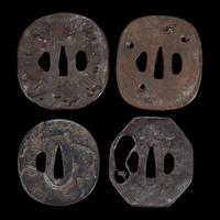 Group of twelve assorted Japanese iron tsuba