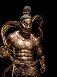 A Pair of Chinese Gilt and Red Lacquered Wood Figures of Wrathful Guardians