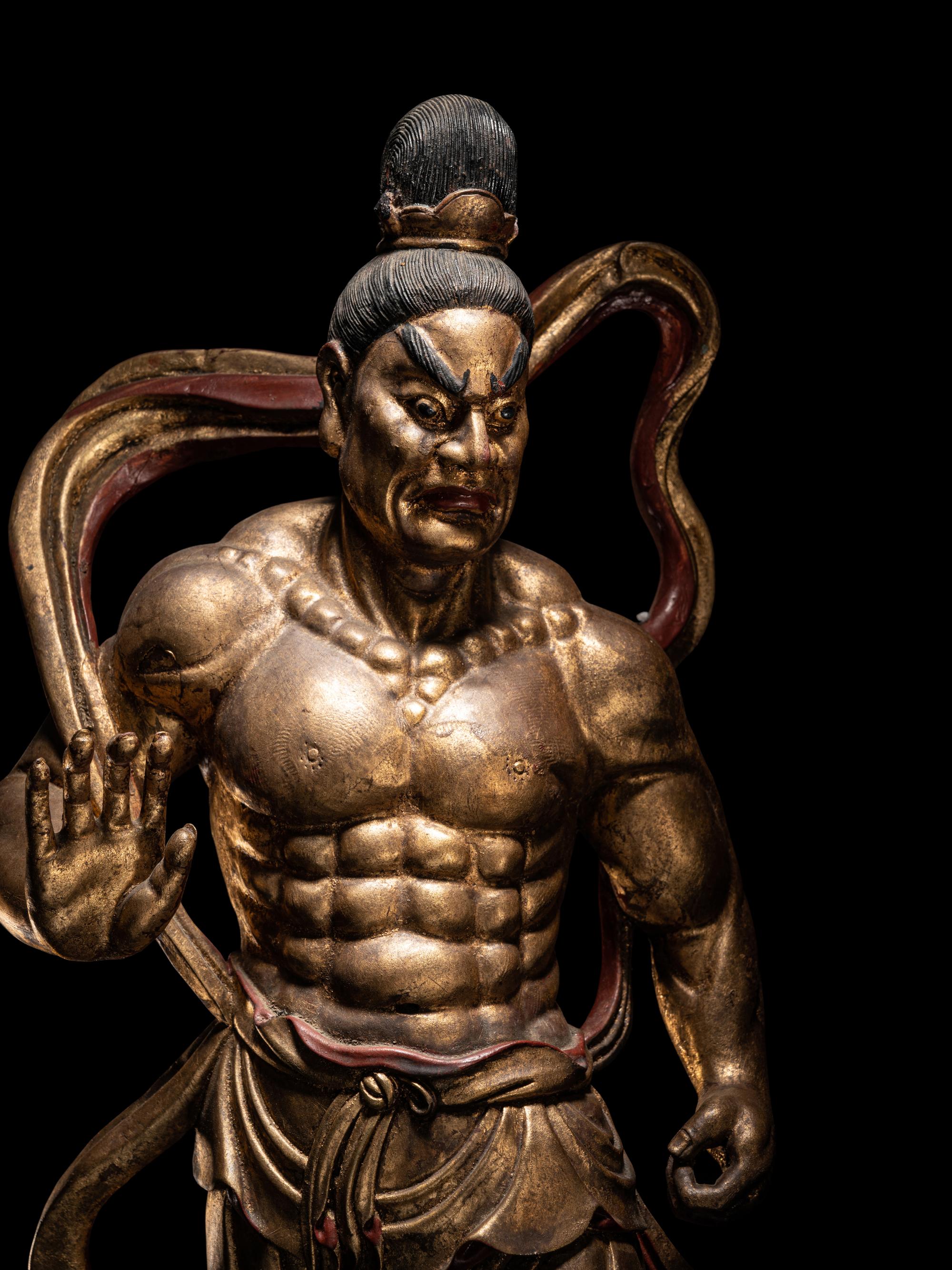 A Pair of Chinese Gilt and Red Lacquered Wood Figures of Wrathful Guardians