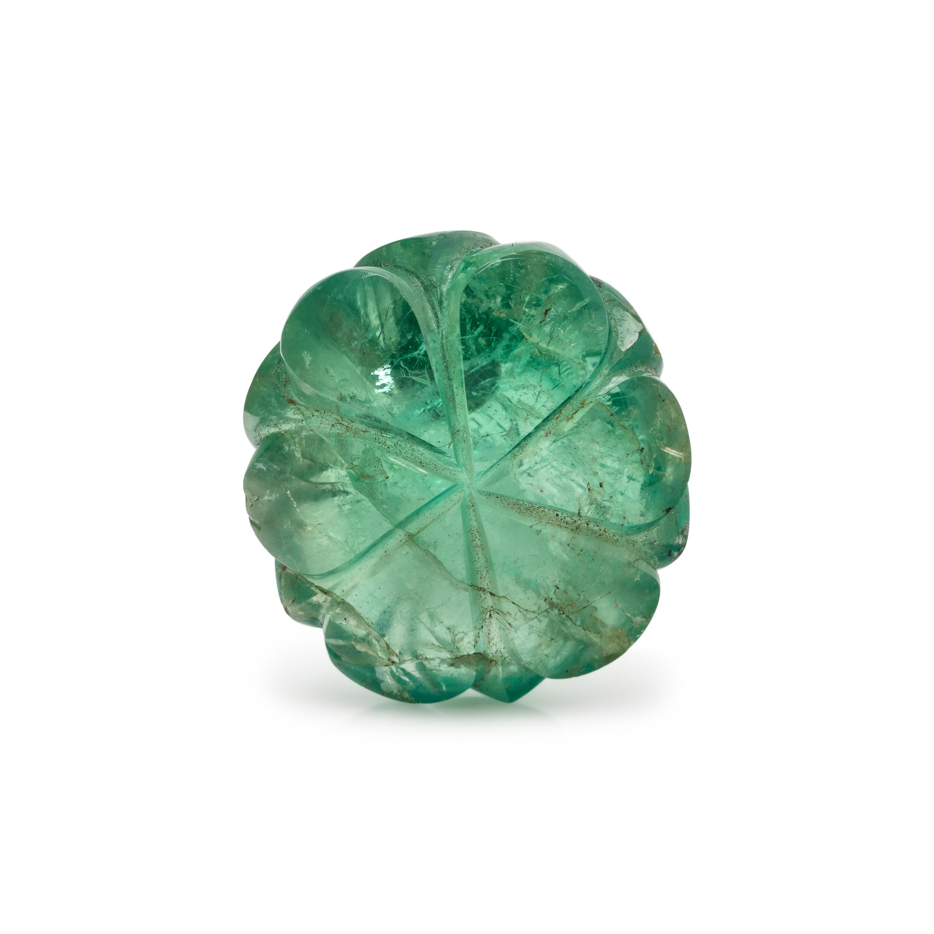 24.13 CARAT CARVED EMERALD