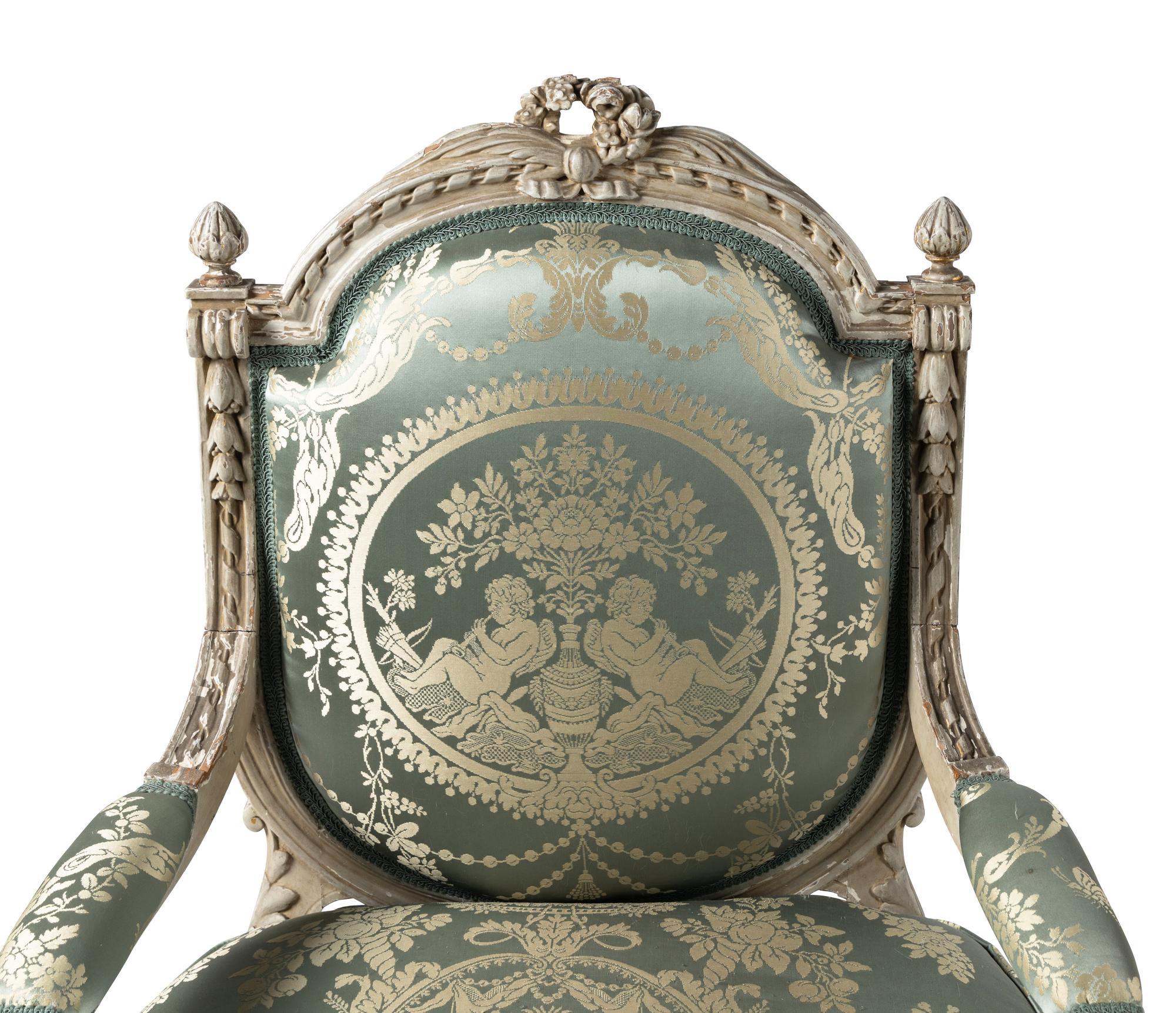 A Pair of Louis XVI Style Painted Fauteuils
