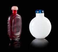 Two Glass Snuff Bottles Height of larger 2 7/8 inches.