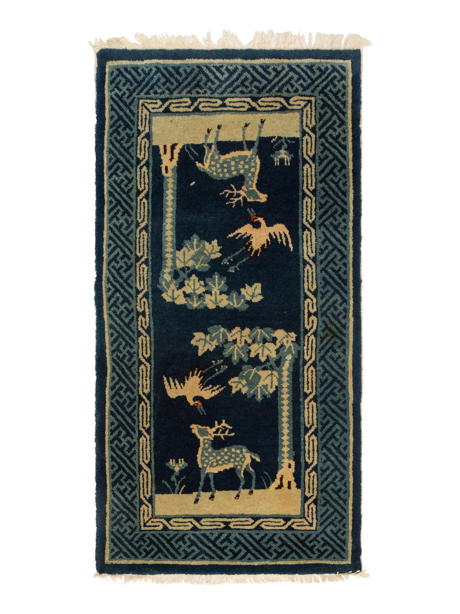 A Group of Three Chinese Rugs