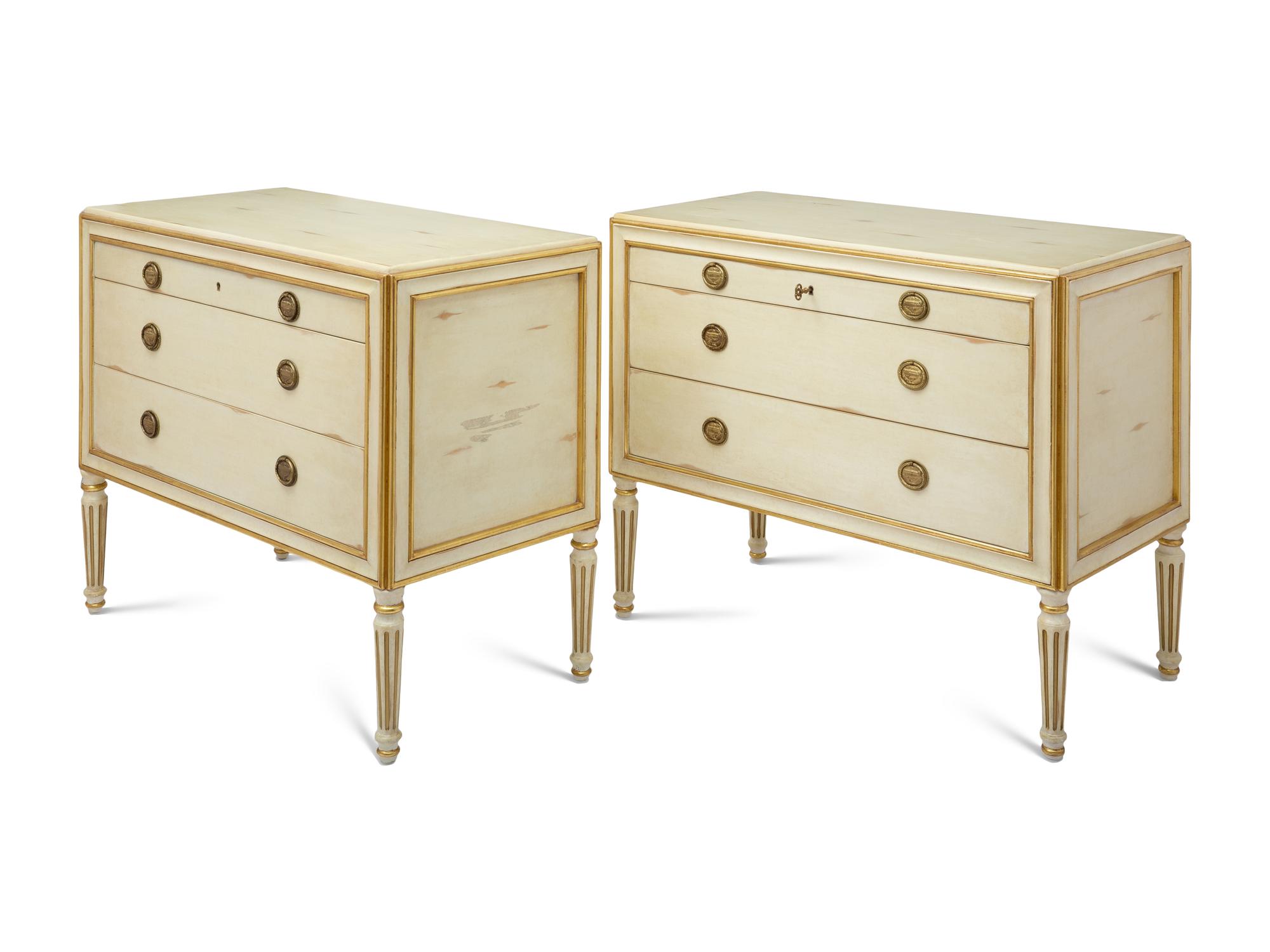 A Pair of Louis XVI Style Painted and Parcel Gilt Commodes