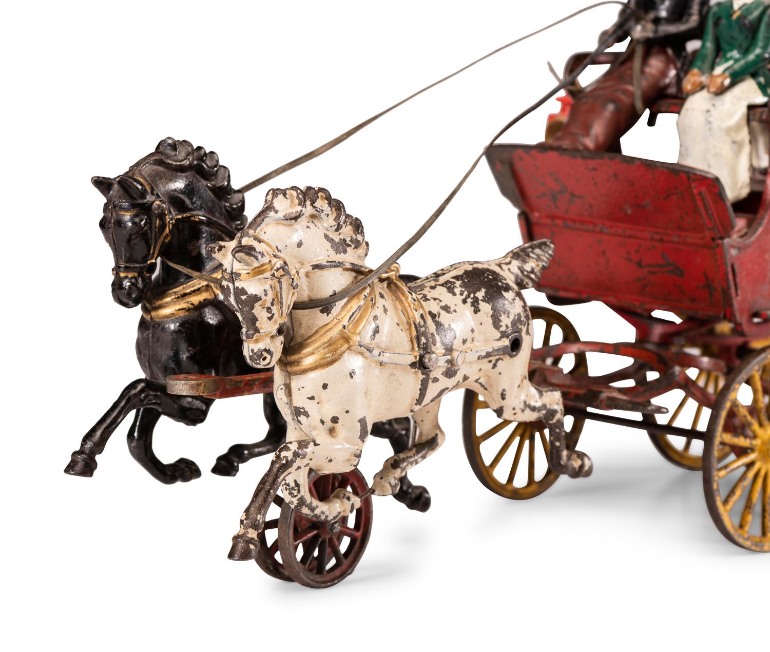 A Hubley Cast Iron Three-Seat Two-Horse Drawn Brake
