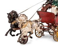 A Hubley Cast Iron Three-Seat Two-Horse Drawn Brake