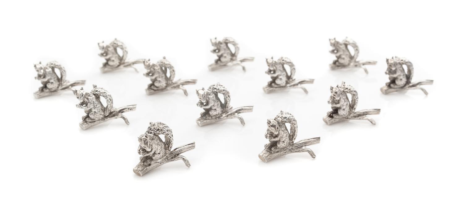 A Set of Twelve American Silver Zoomorphic Placecard Holders, Tiffany & Co., New York, 20th Century, each in the form of a squirrel wit