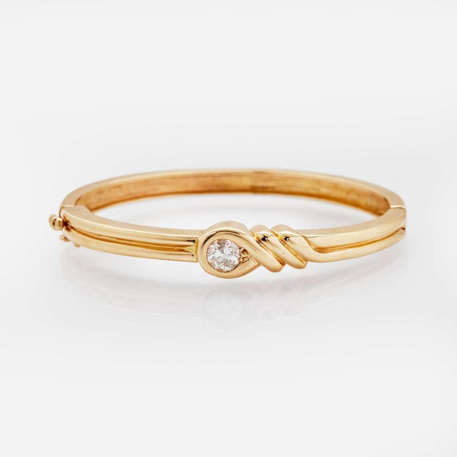 A 14K Yellow Gold and Diamond Bracelet
