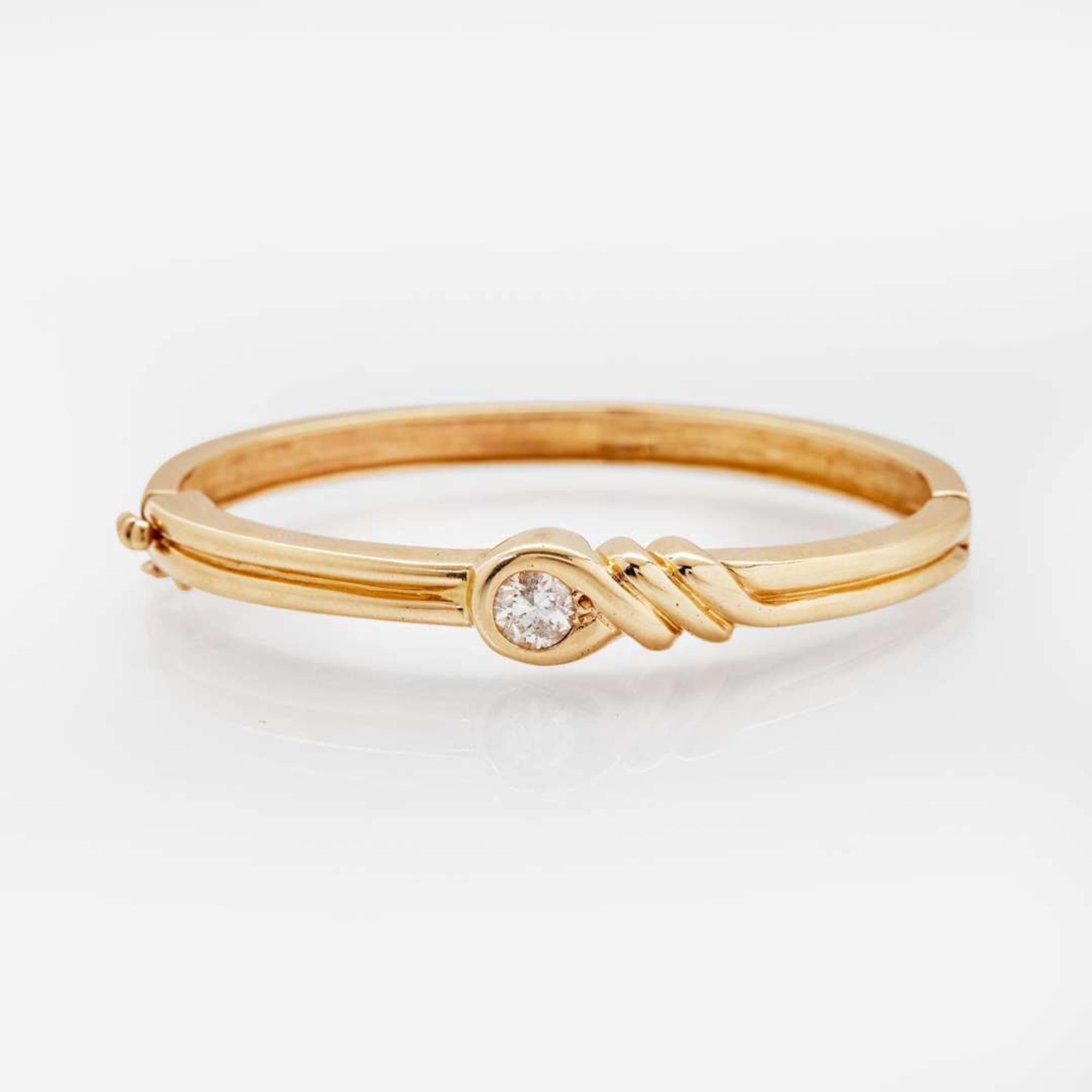 A 14K Yellow Gold and Diamond Bracelet