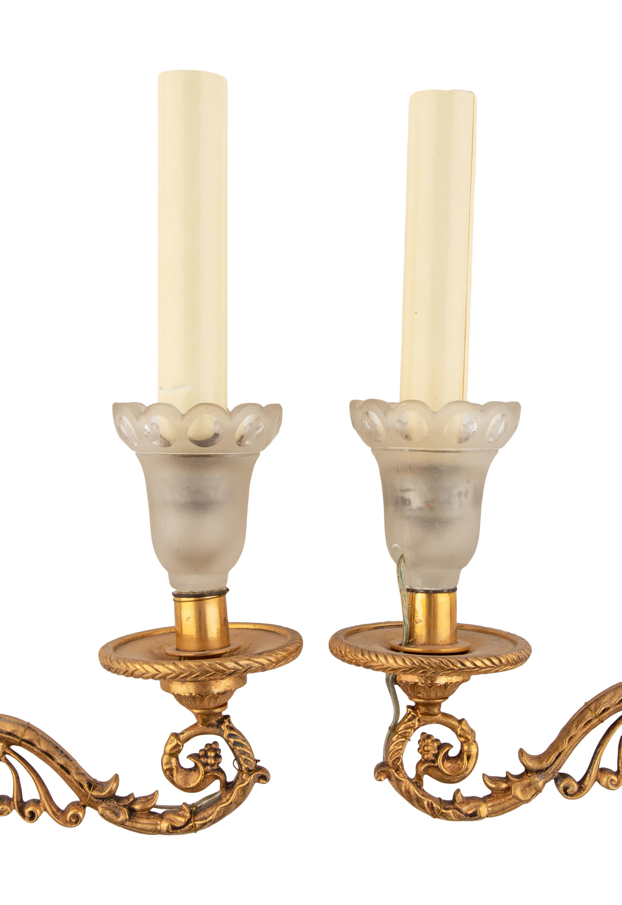 A Pair of French Gilt Bronze and Frosted Glass Two-Light Sconces