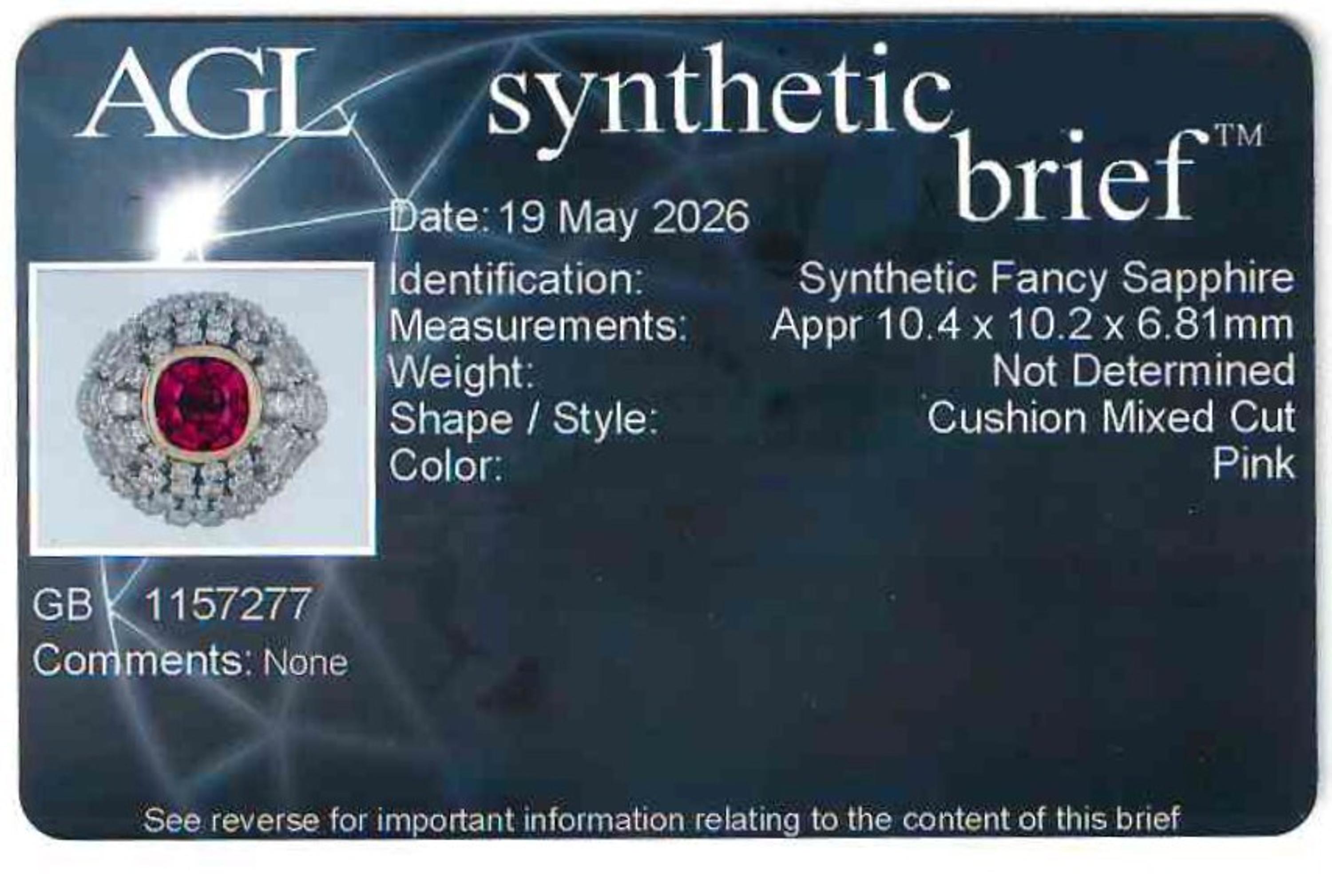 Synthetic Pink Sapphire, Diamond, and Platinum Bombé Ring
