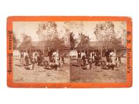 [NATIVE AMERICANS]. ROTHROCK, G.H. (1843-1924), photographer. Stereoview of Apache scouts and officers in front of quarters, Camp Verde. [Phoenix, AZ].