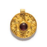 A Roman Gold Pendant with a Garnet Cabochon