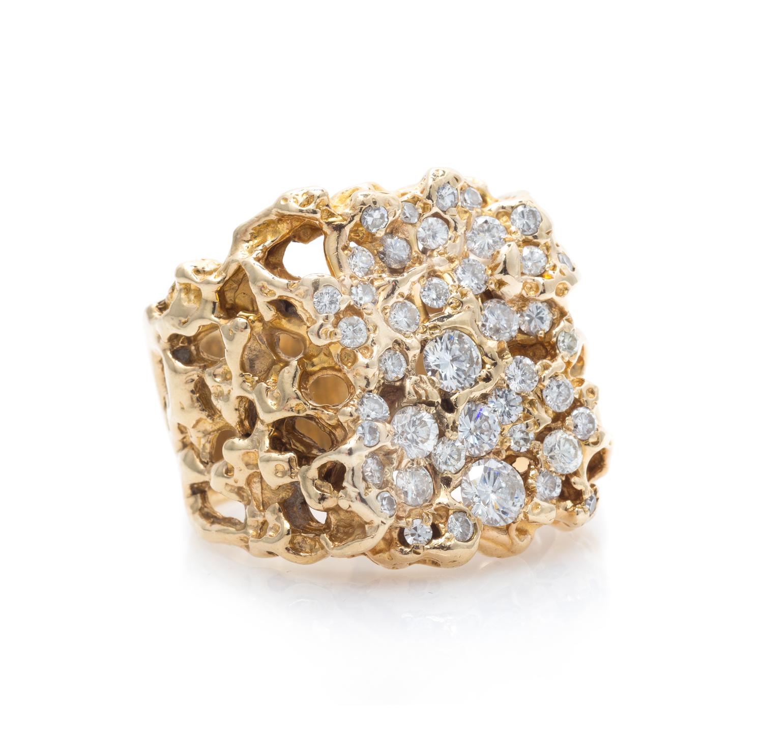 A 14 Karat Gold and Diamond Ring, 18.90 dwts.