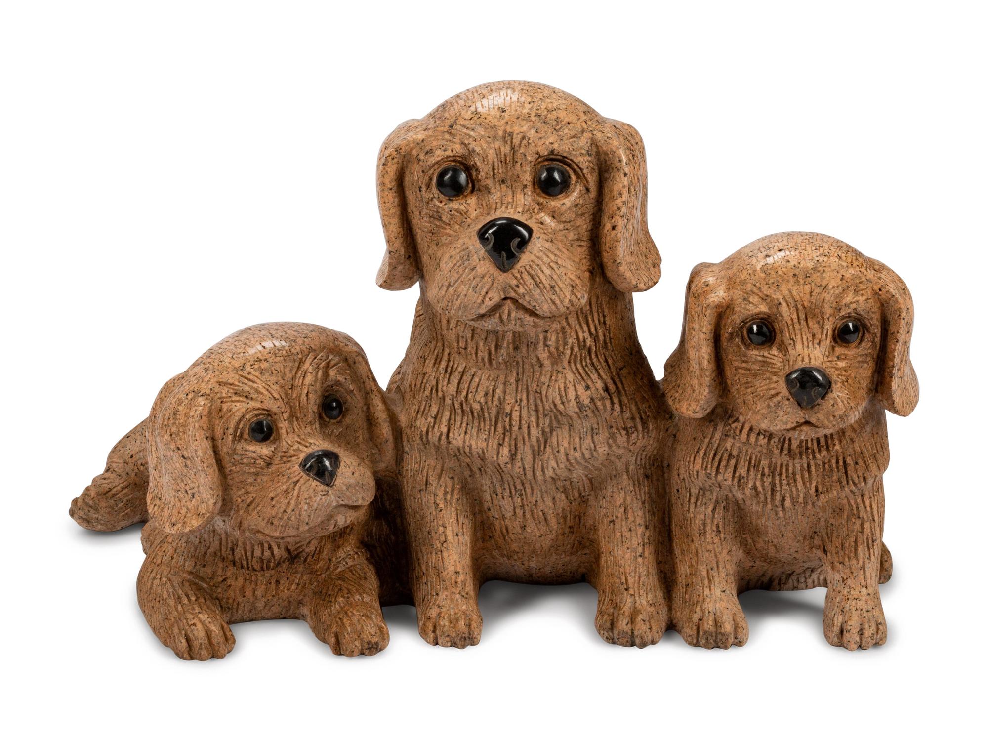 An Italian Carved Stone Figural Group of Dogs