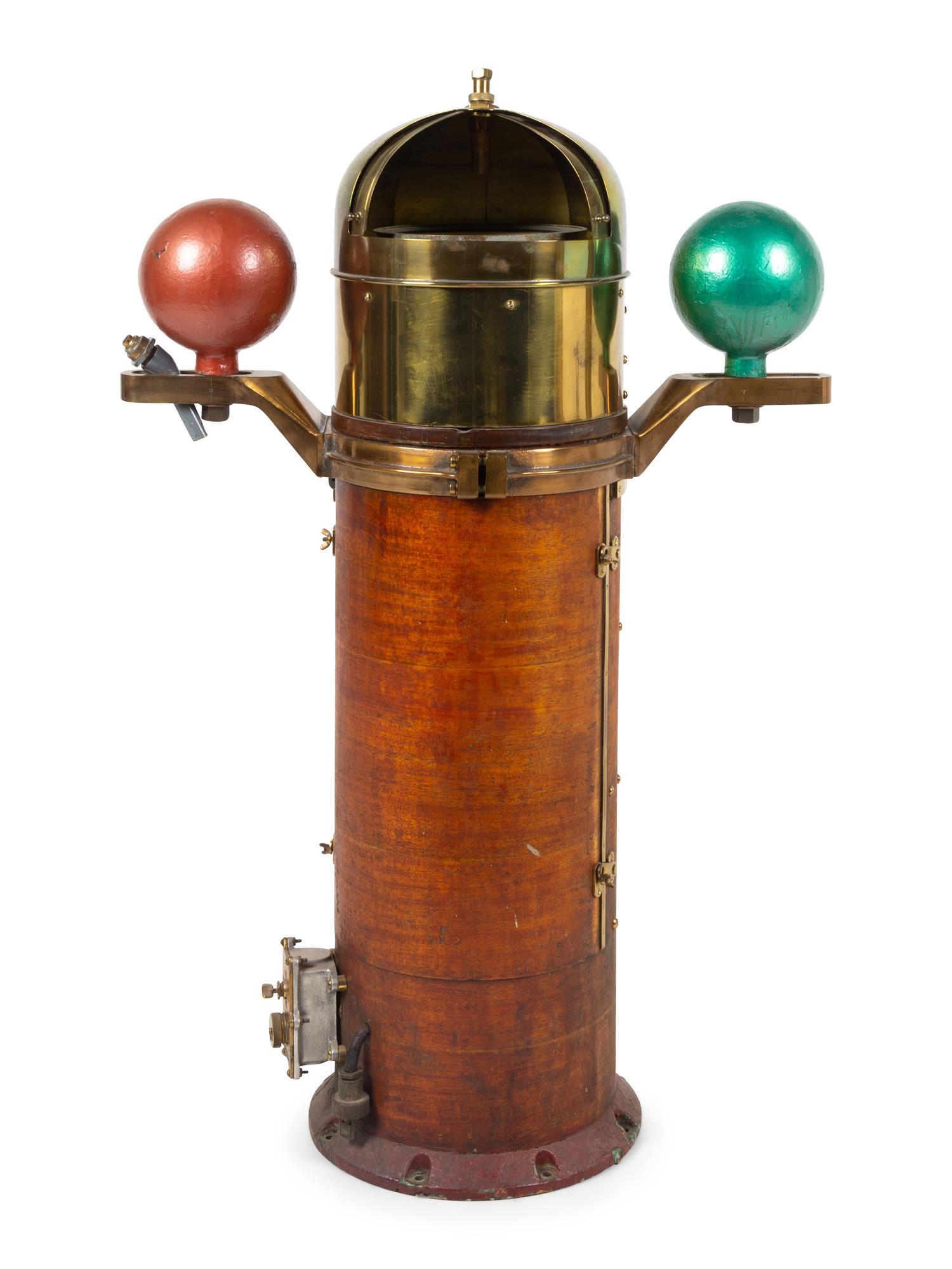 A Lionel Corporation Brass and Mahogany Cased Ship's Binnicle