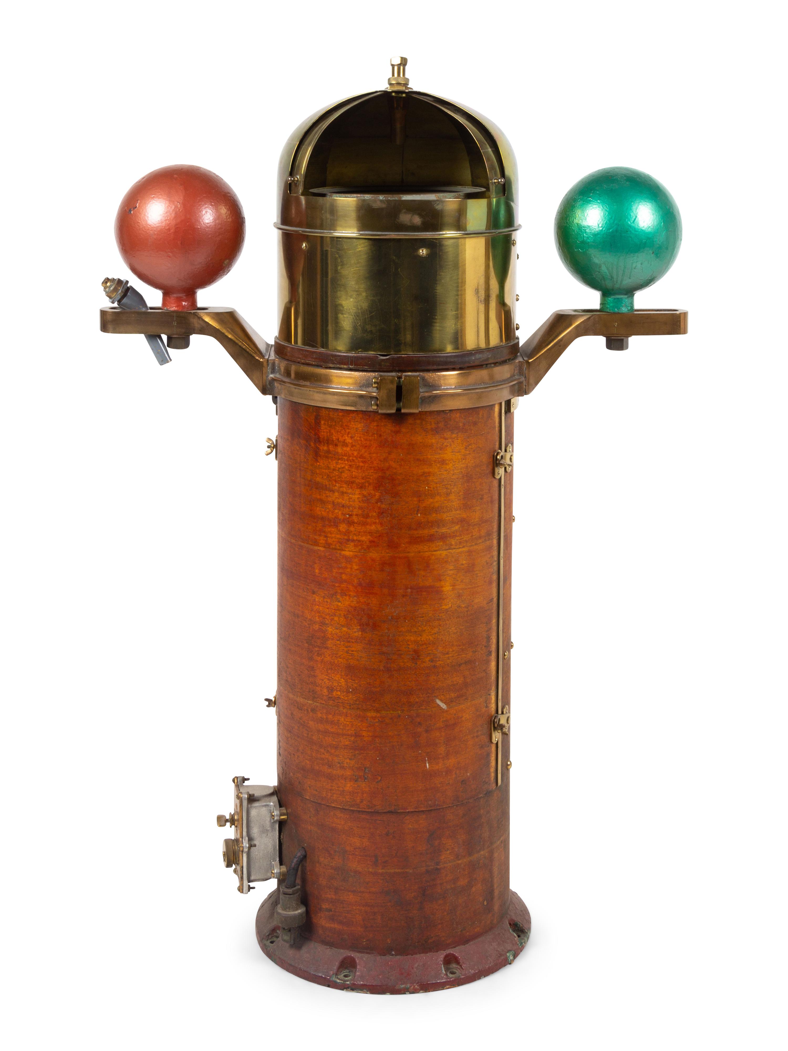 A Lionel Corporation Brass and Mahogany Cased Ship's Binnicle